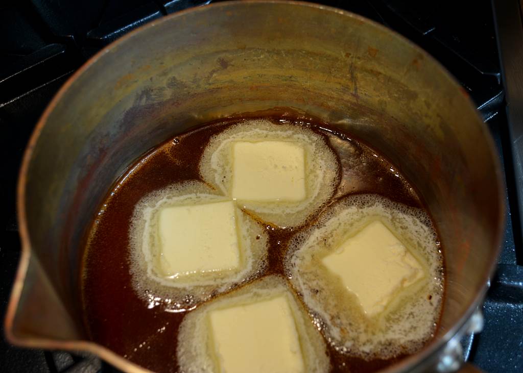 adding-butter-to-caramelized-sugar