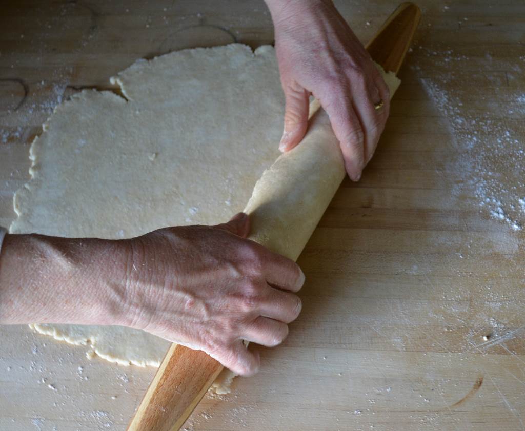 Best-Pie-Dough-rolling-on-pin-to-transfer