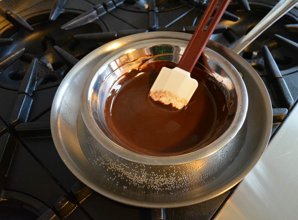preparing-chocolate-glaze-on-skillet